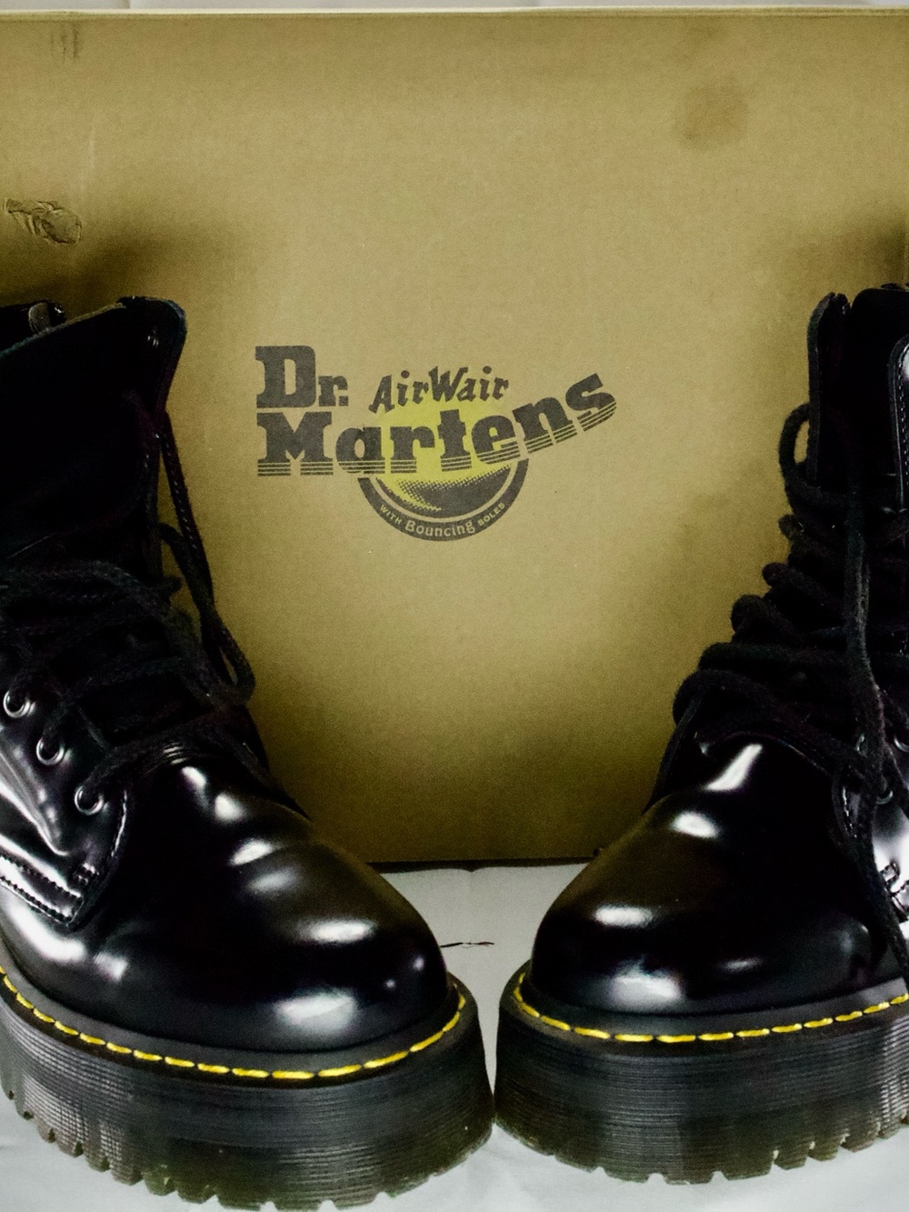 Dr. Martens Black Leather Platform Lace-Up Boots with Yellow Stitching